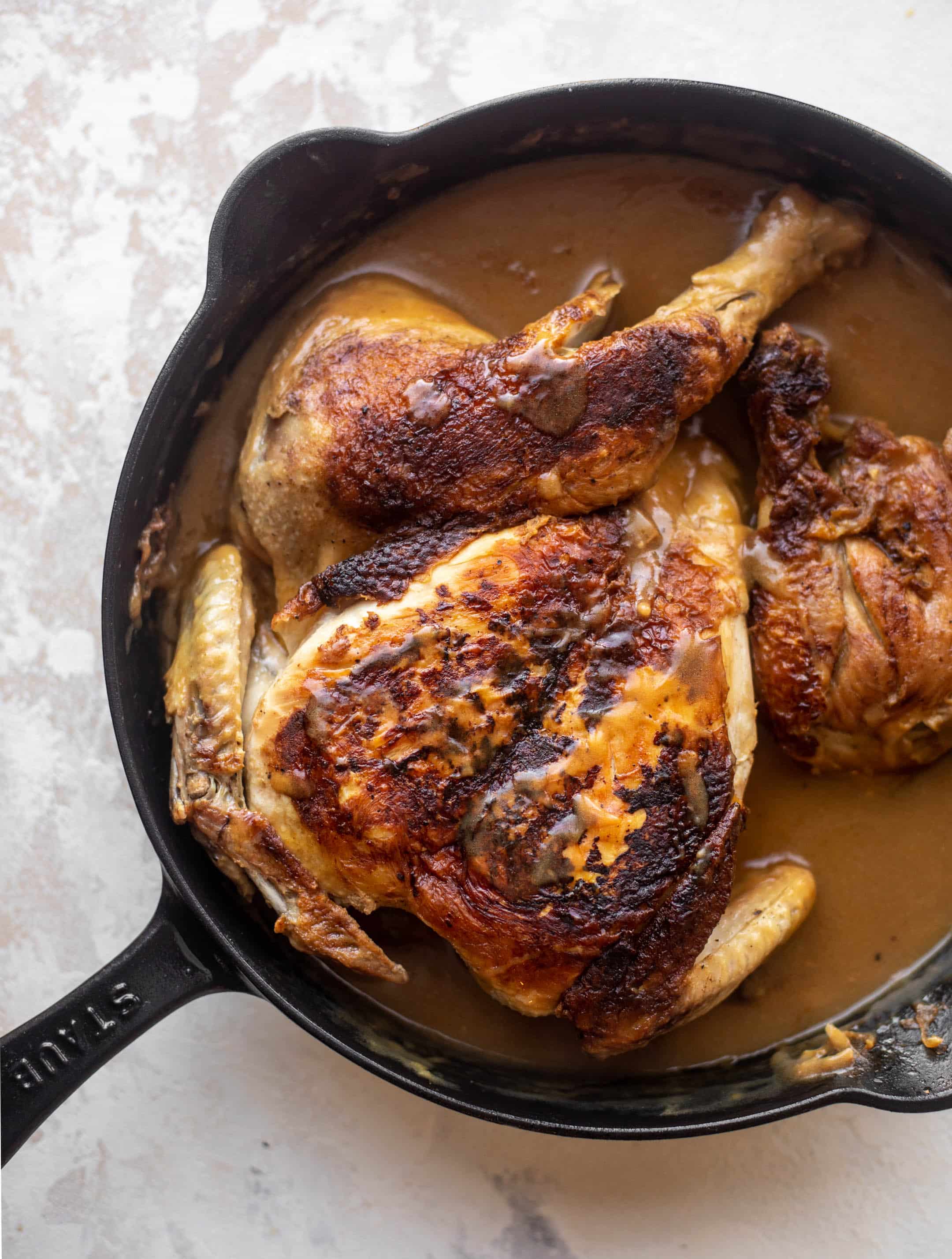 spatchcock smothered chicken