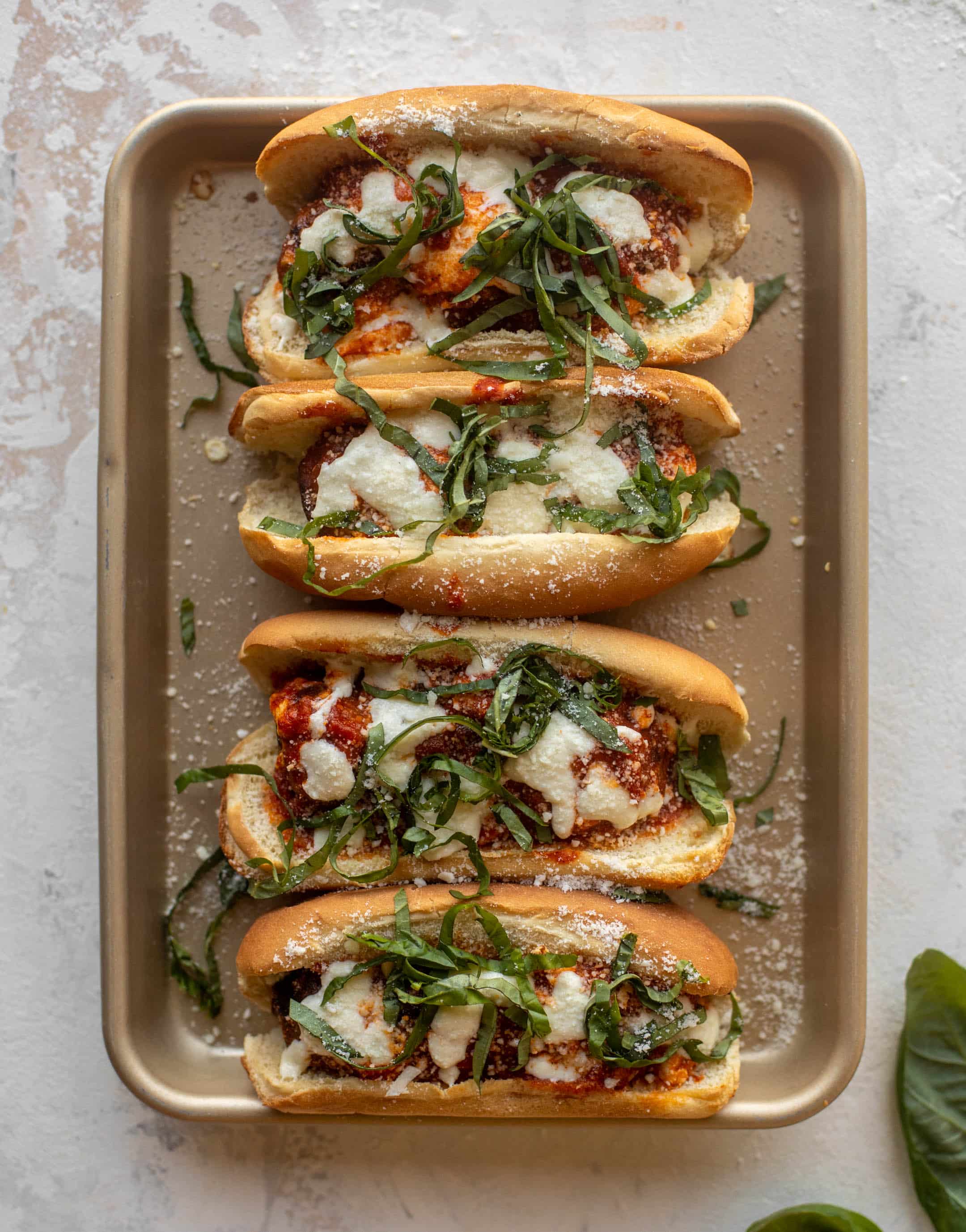 cheesy basil meatball subs