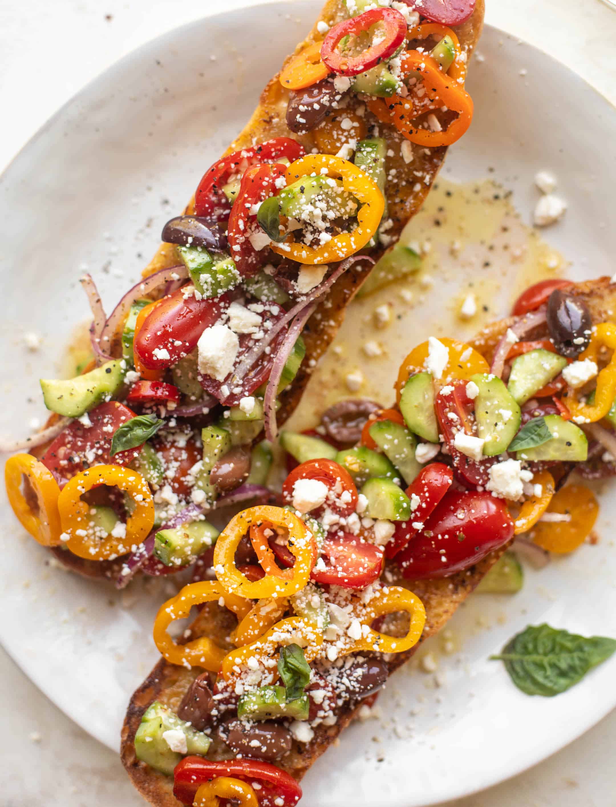 grilled garlic baguettes with greek salad