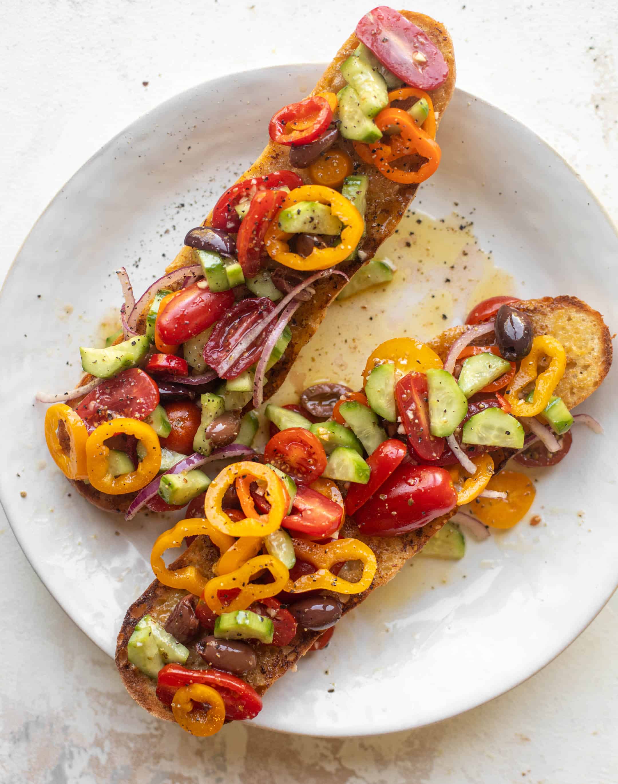 grilled garlic baguettes with greek salad