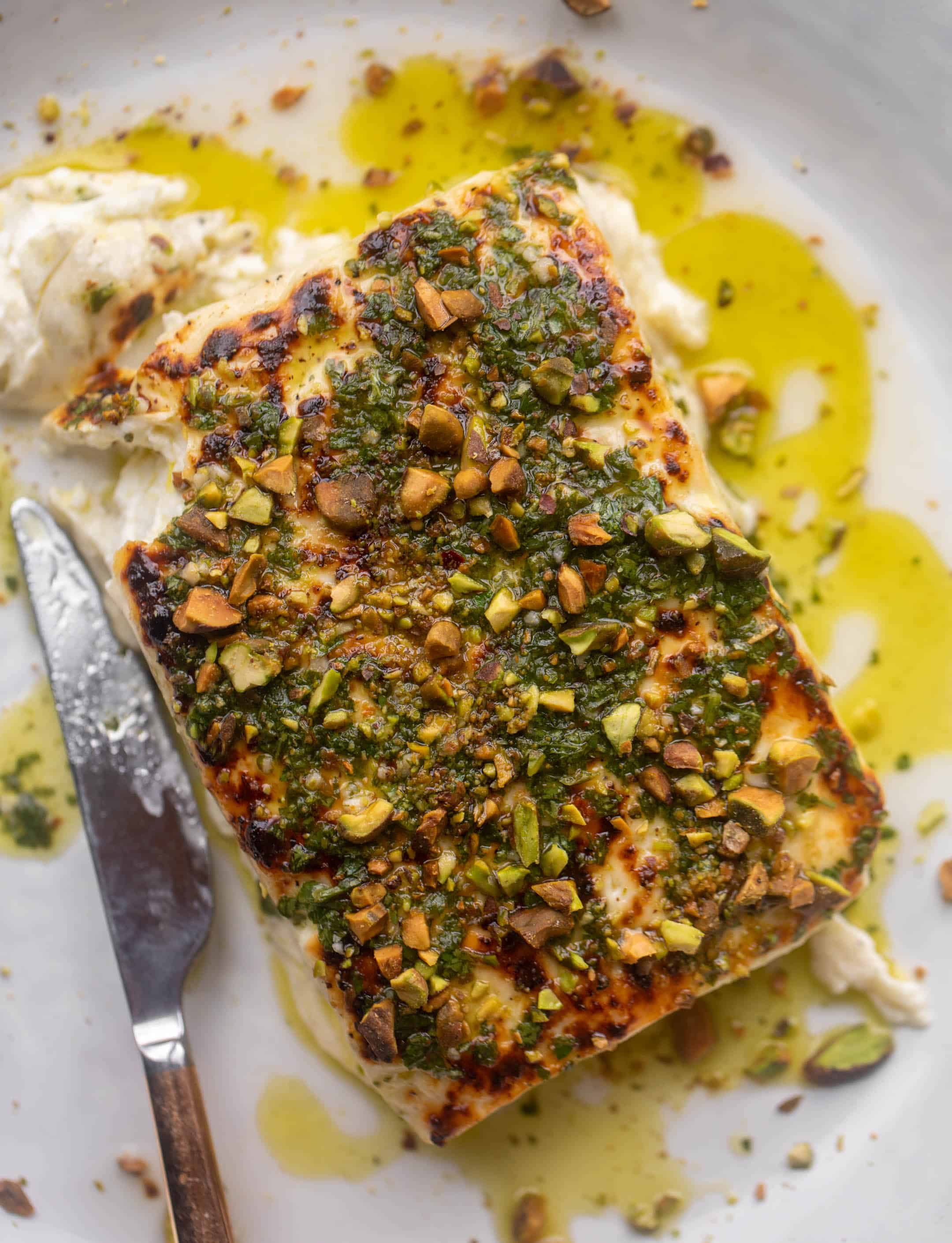 grilled feta with pistachios and chimichurri