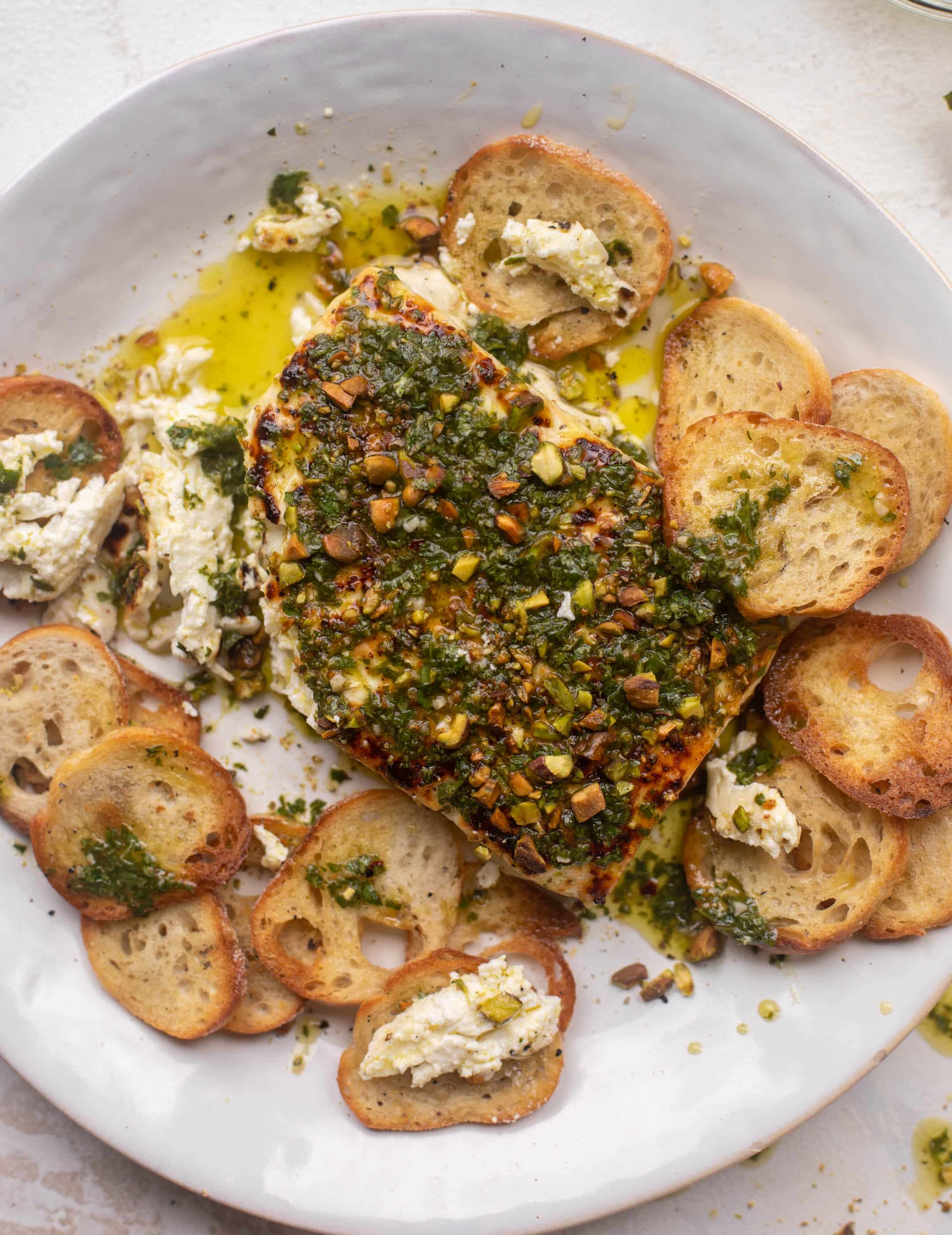 grilled feta with pistachios and chimichurri