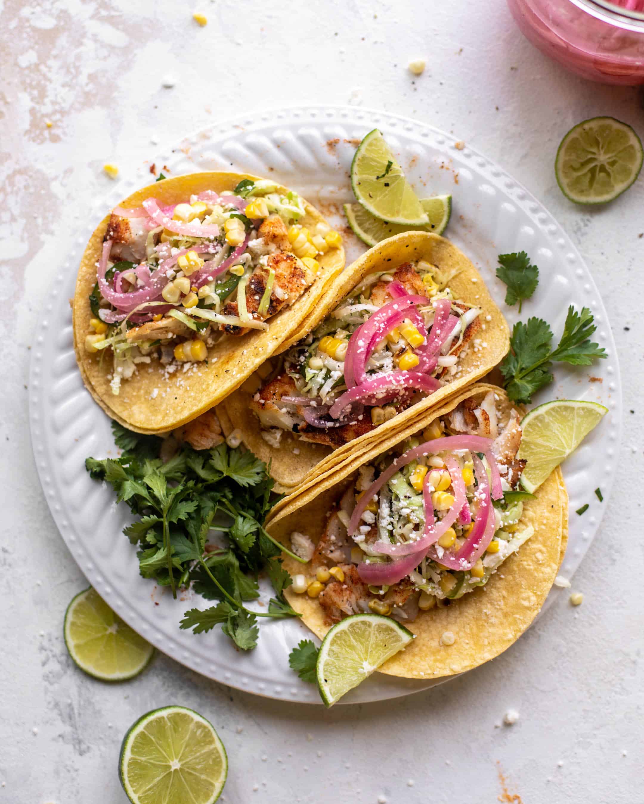 grilled fish tacos with jalapeño corn slaw