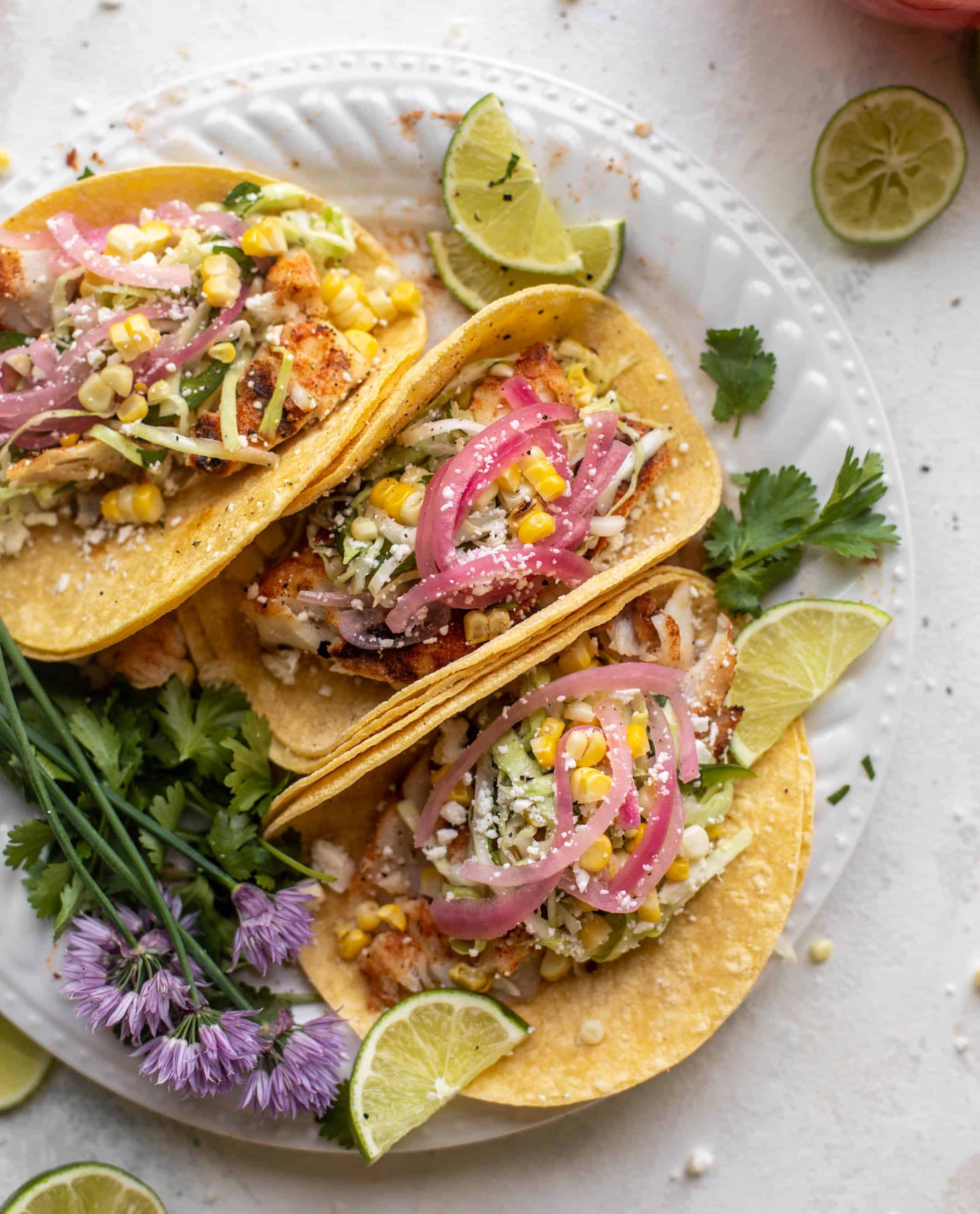 grilled fish tacos with jalapeño corn slaw