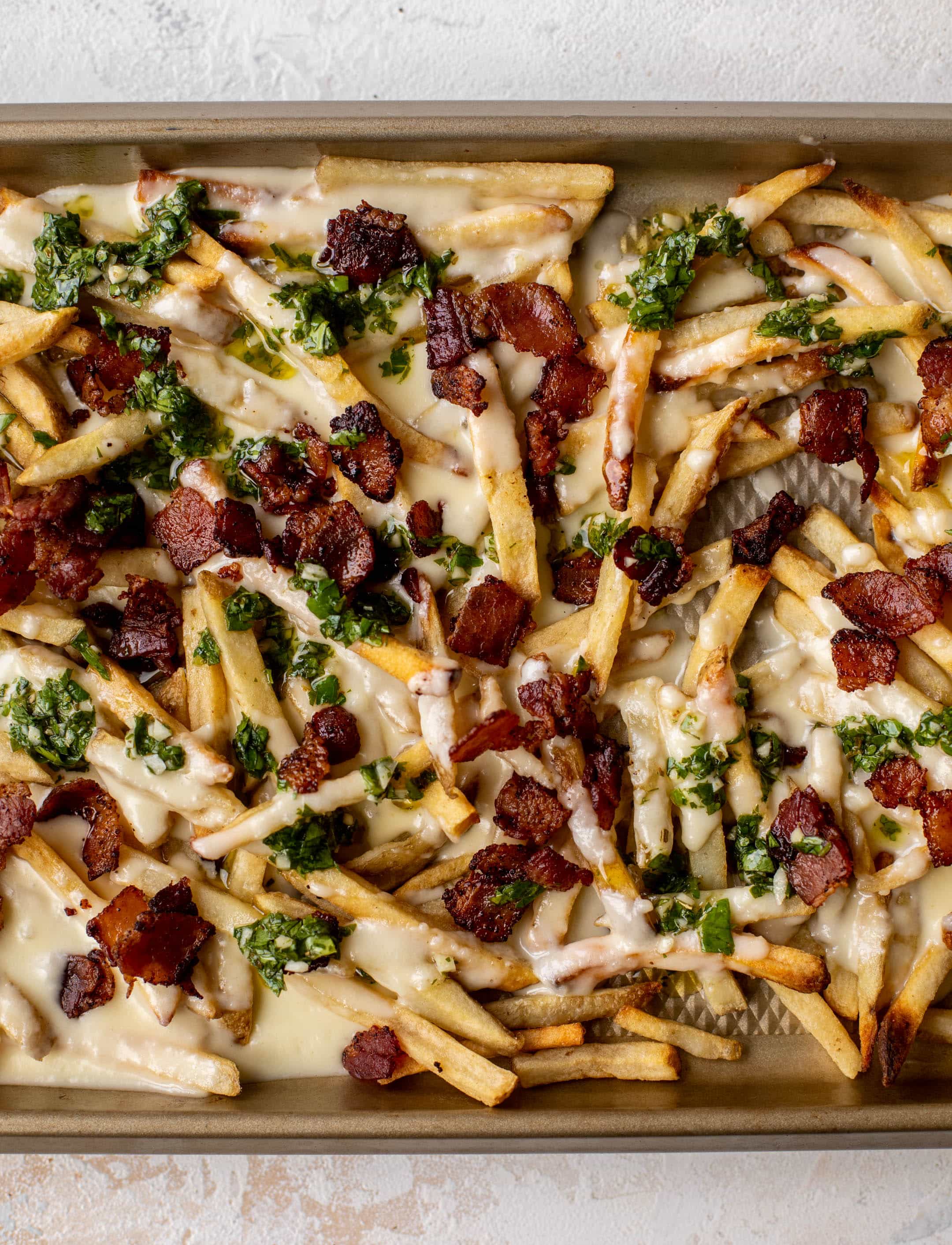 chimichurri cheese fries with chipotle bacon