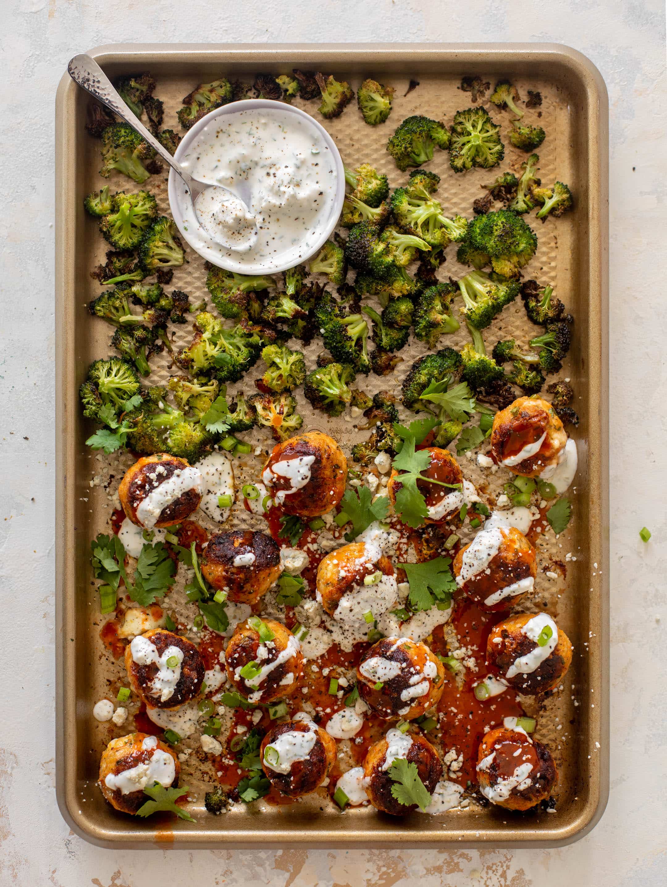 sheet pan buffalo chicken meatballs & broccoli