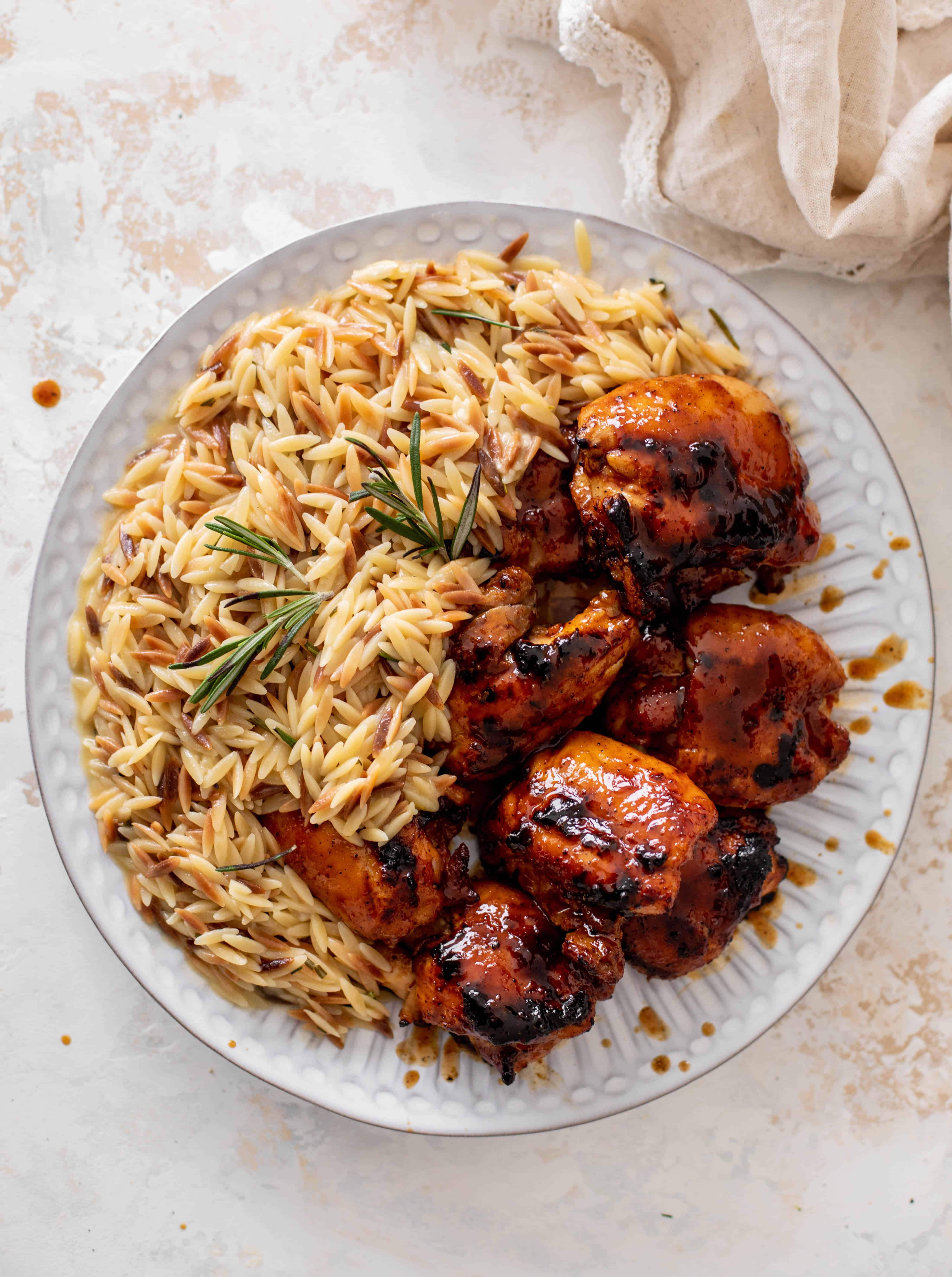 hot honey chicken thighs with rosemary orzo