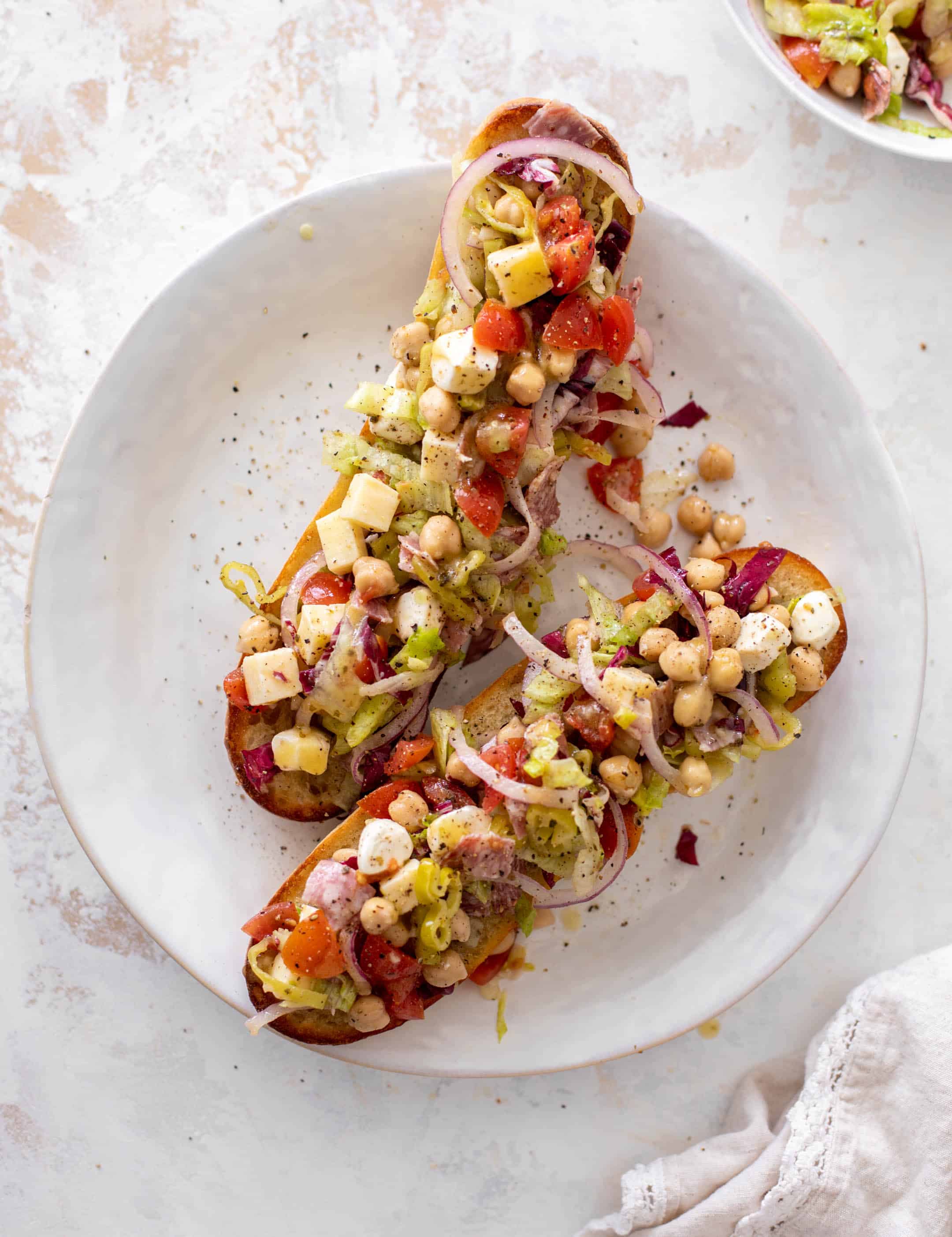 italian chopped salad on garlic bread