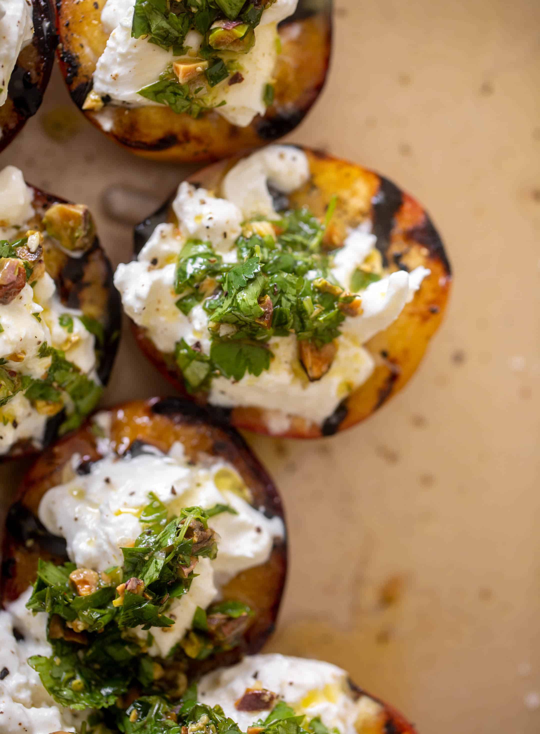 grilled peaches with burrata and pistachio vinaigrette