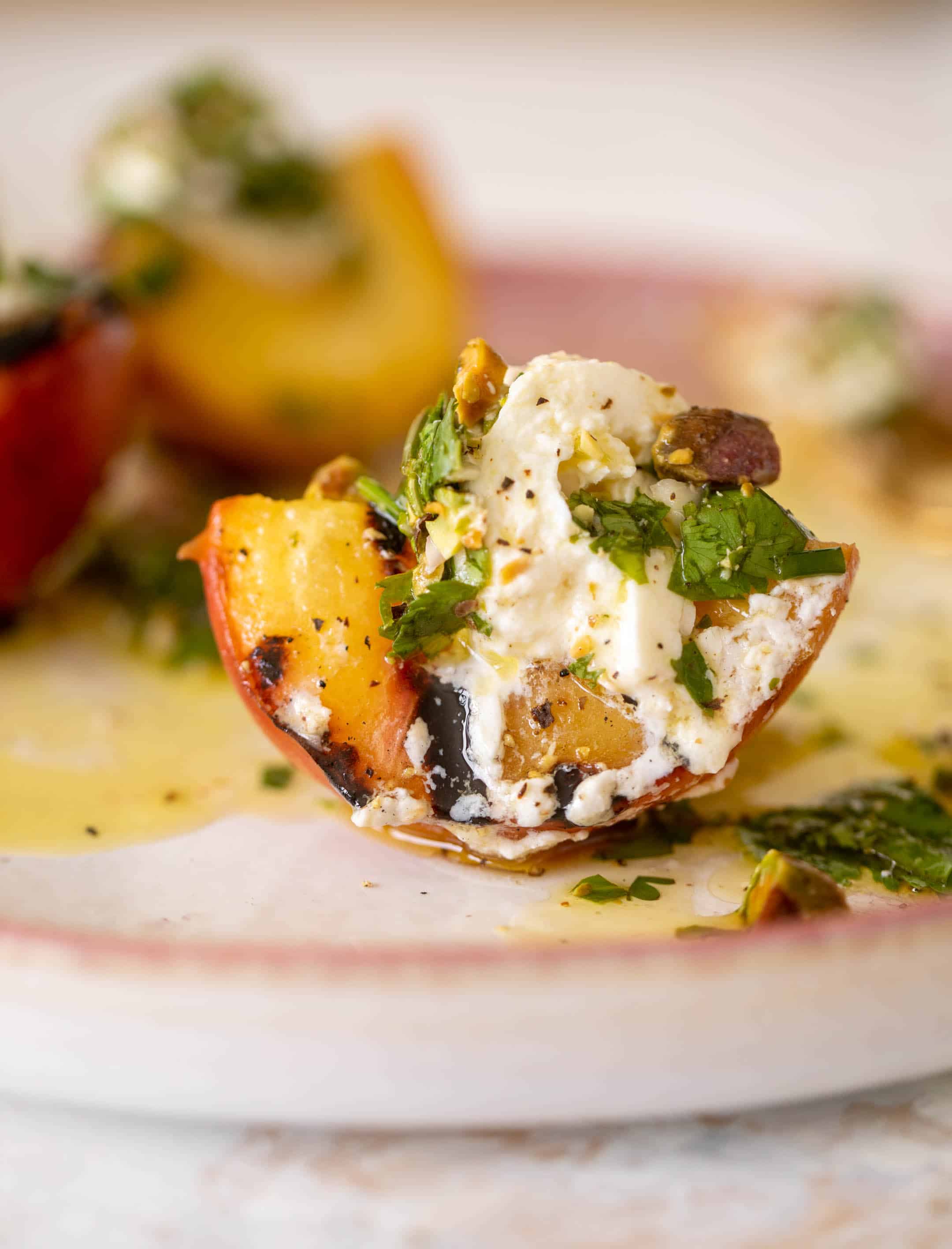 grilled peaches with burrata and pistachio vinaigrette