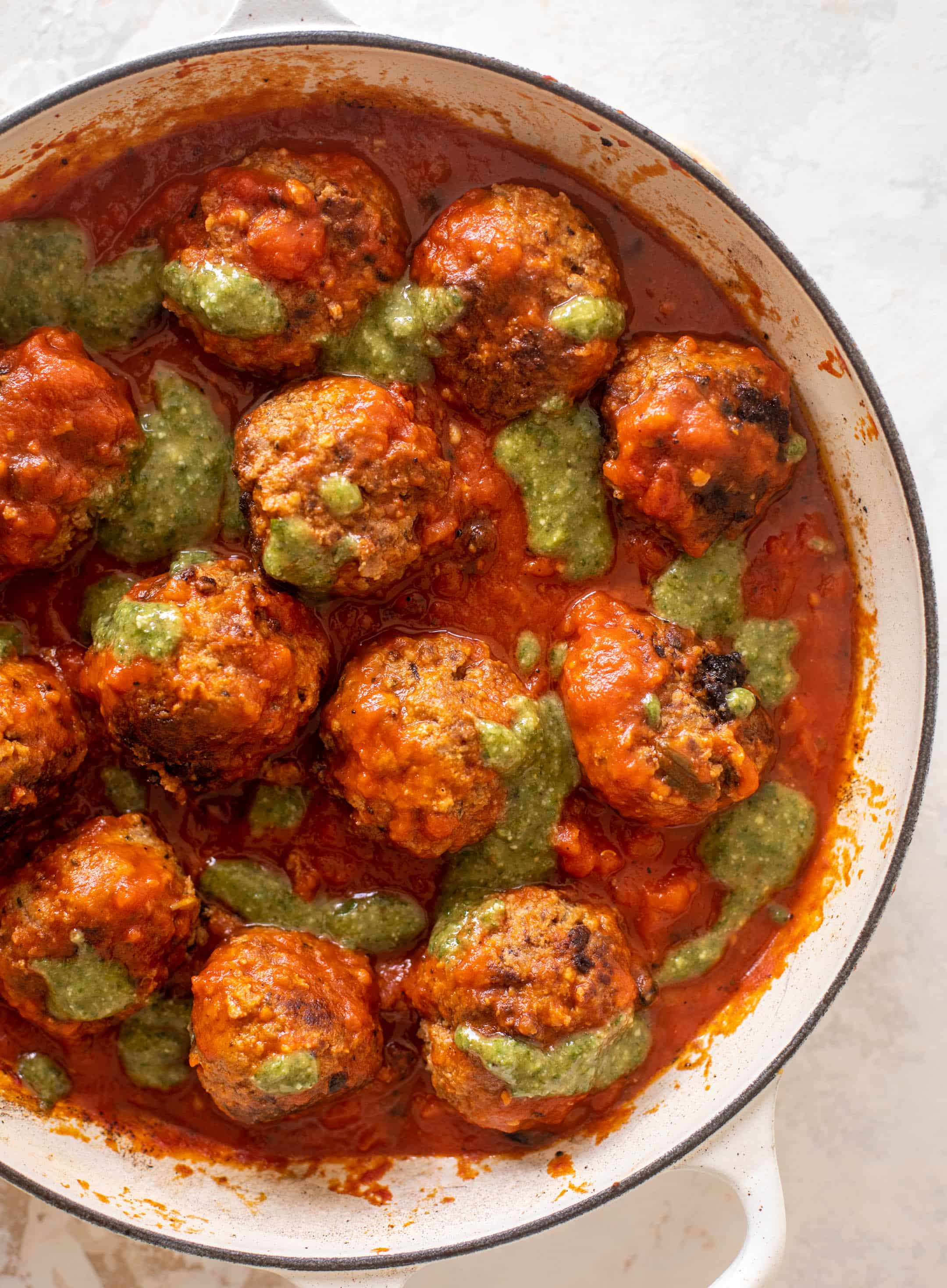 cheesy baked pesto meatballs with burrata