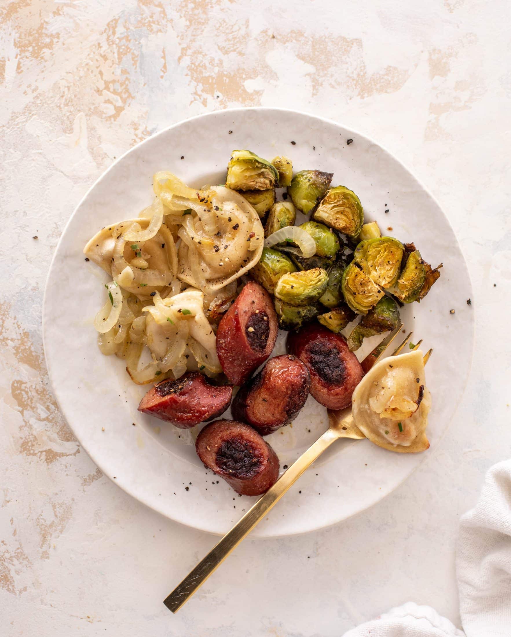 sheet pan pierogi, smoked sausage and brussels sprouts