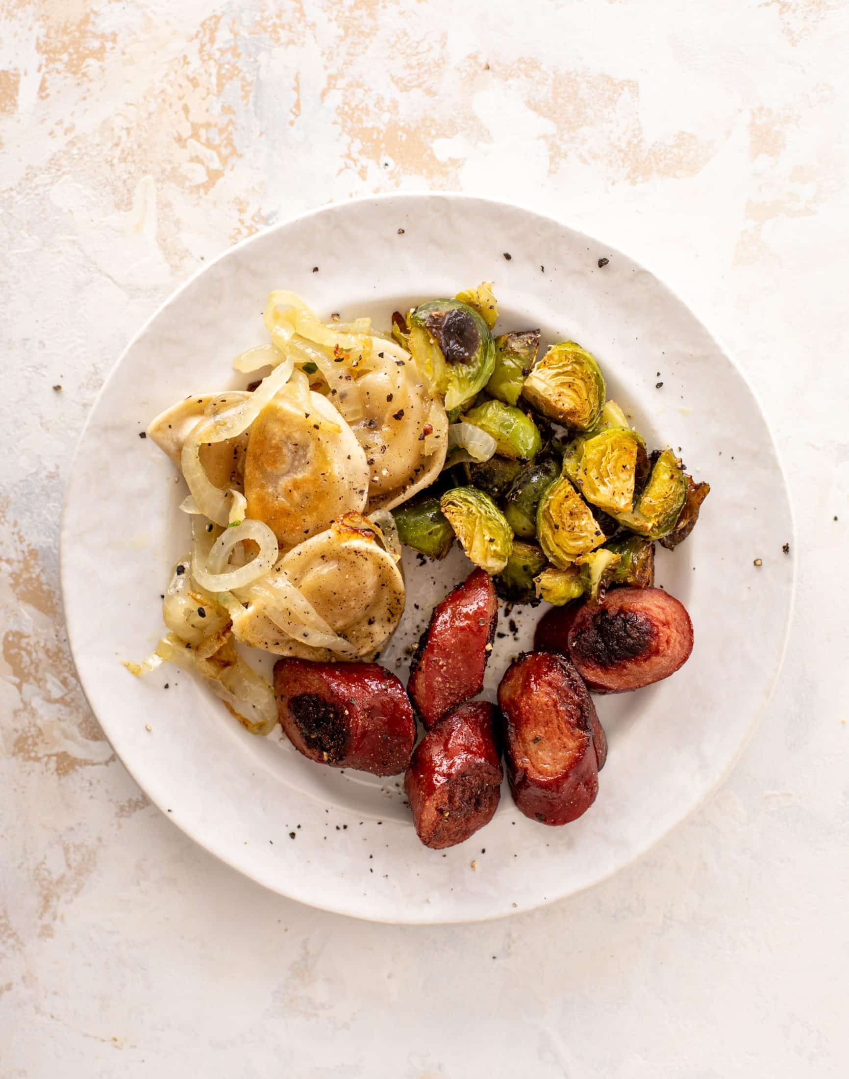 sheet pan pierogi, smoked sausage and brussels sprouts