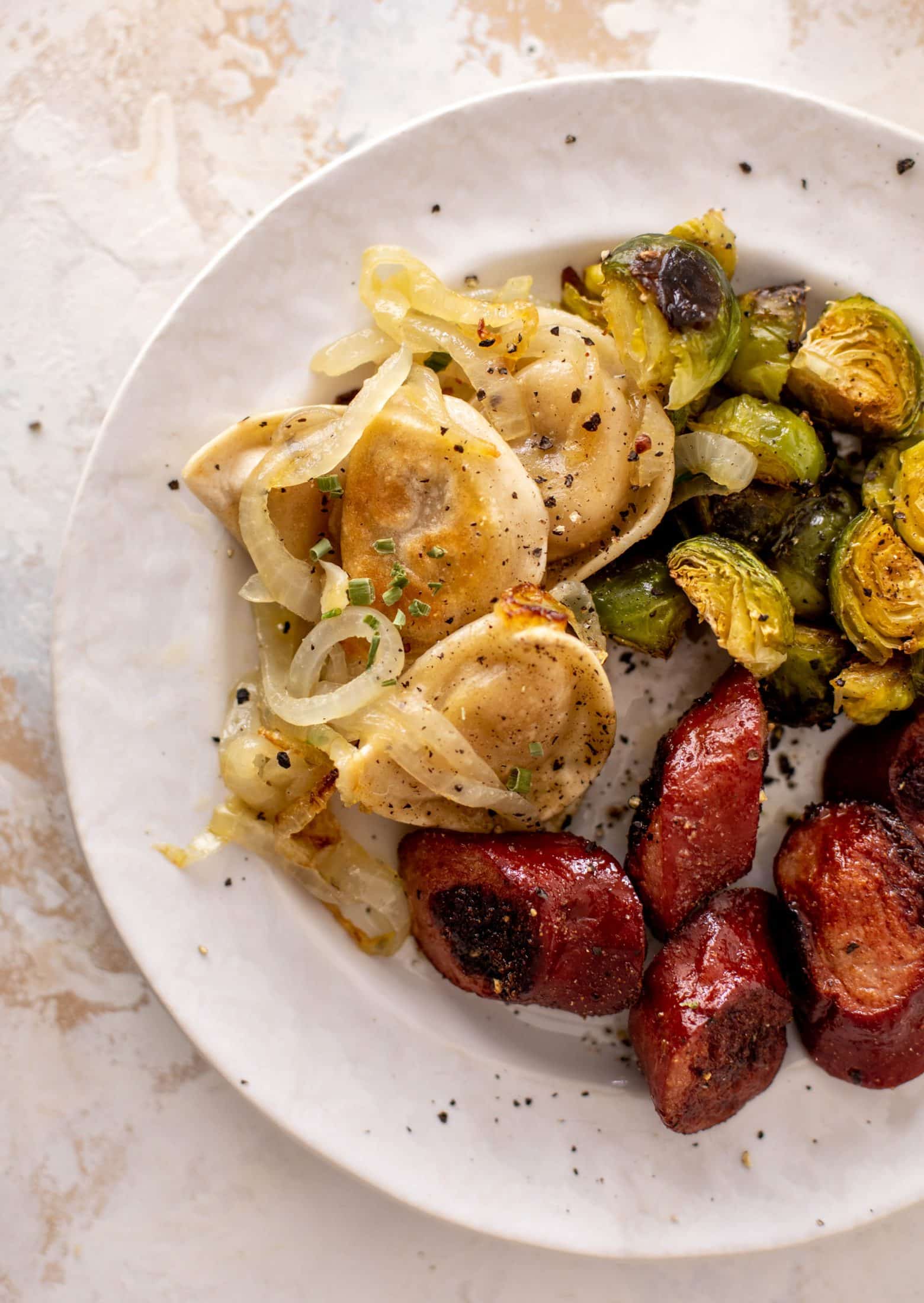 sheet pan pierogi, smoked sausage and brussels sprouts