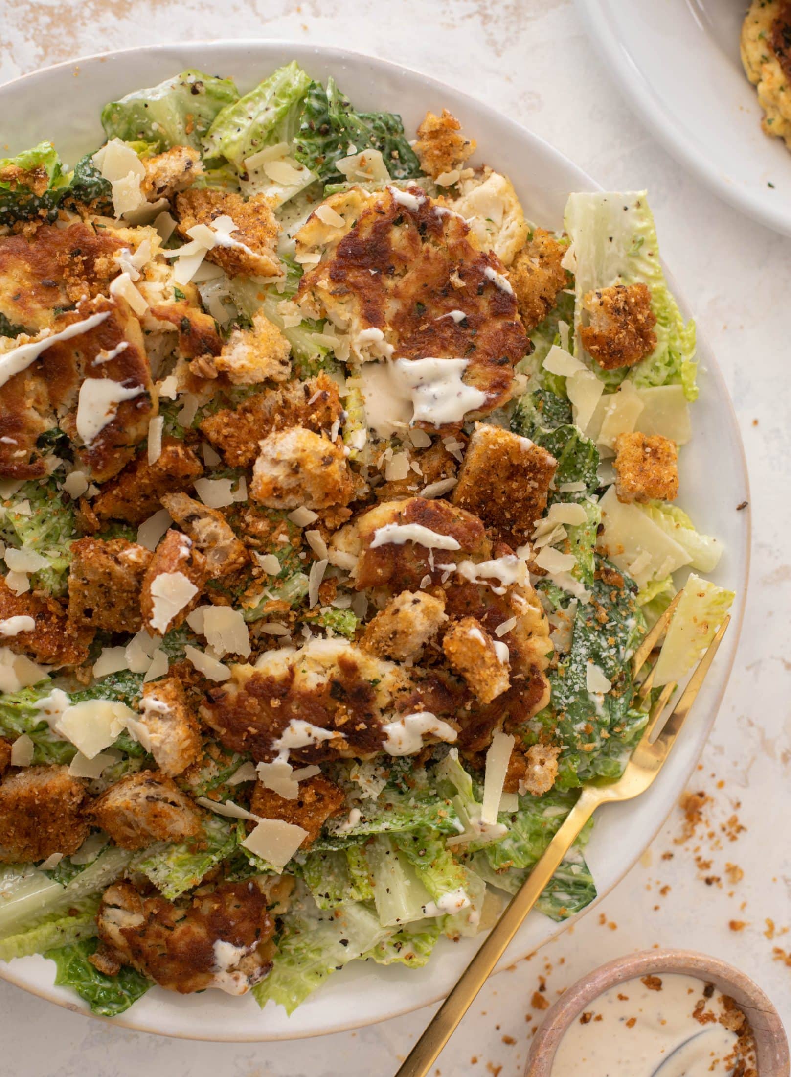 crab cake caesar with old bay croutons