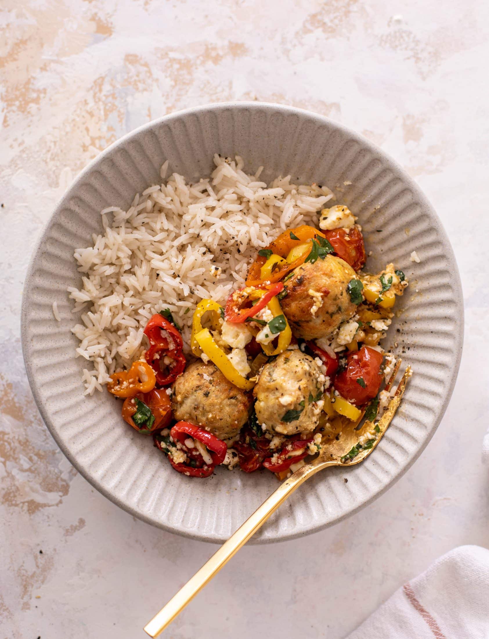 sheet pan chicken meatballs with tomatoes and feta