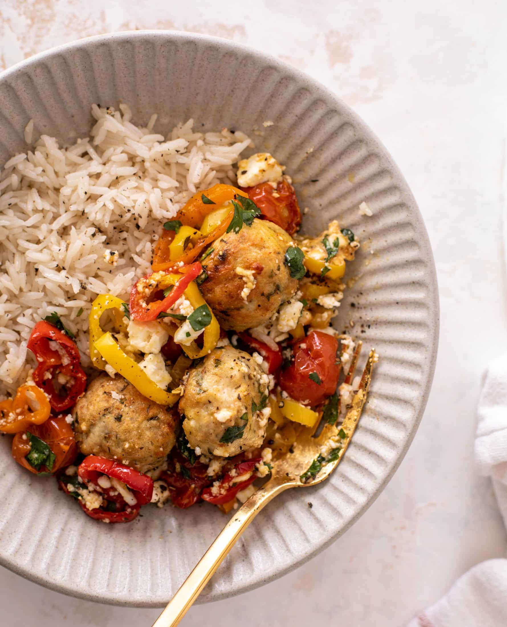 sheet pan chicken meatballs with tomatoes and feta