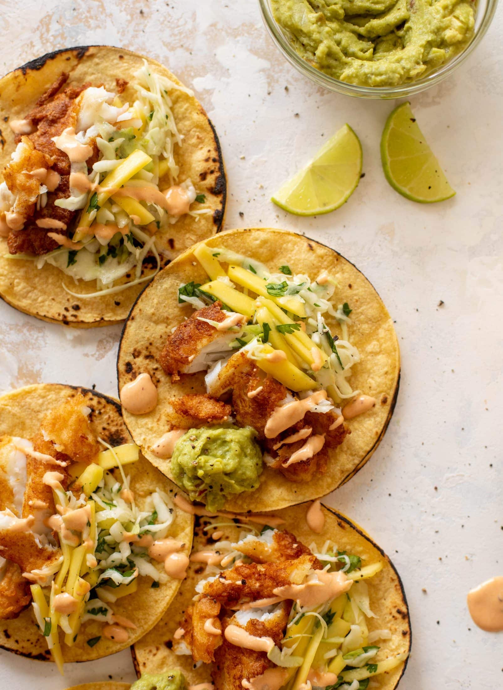 crispy fish tacos with mango slaw