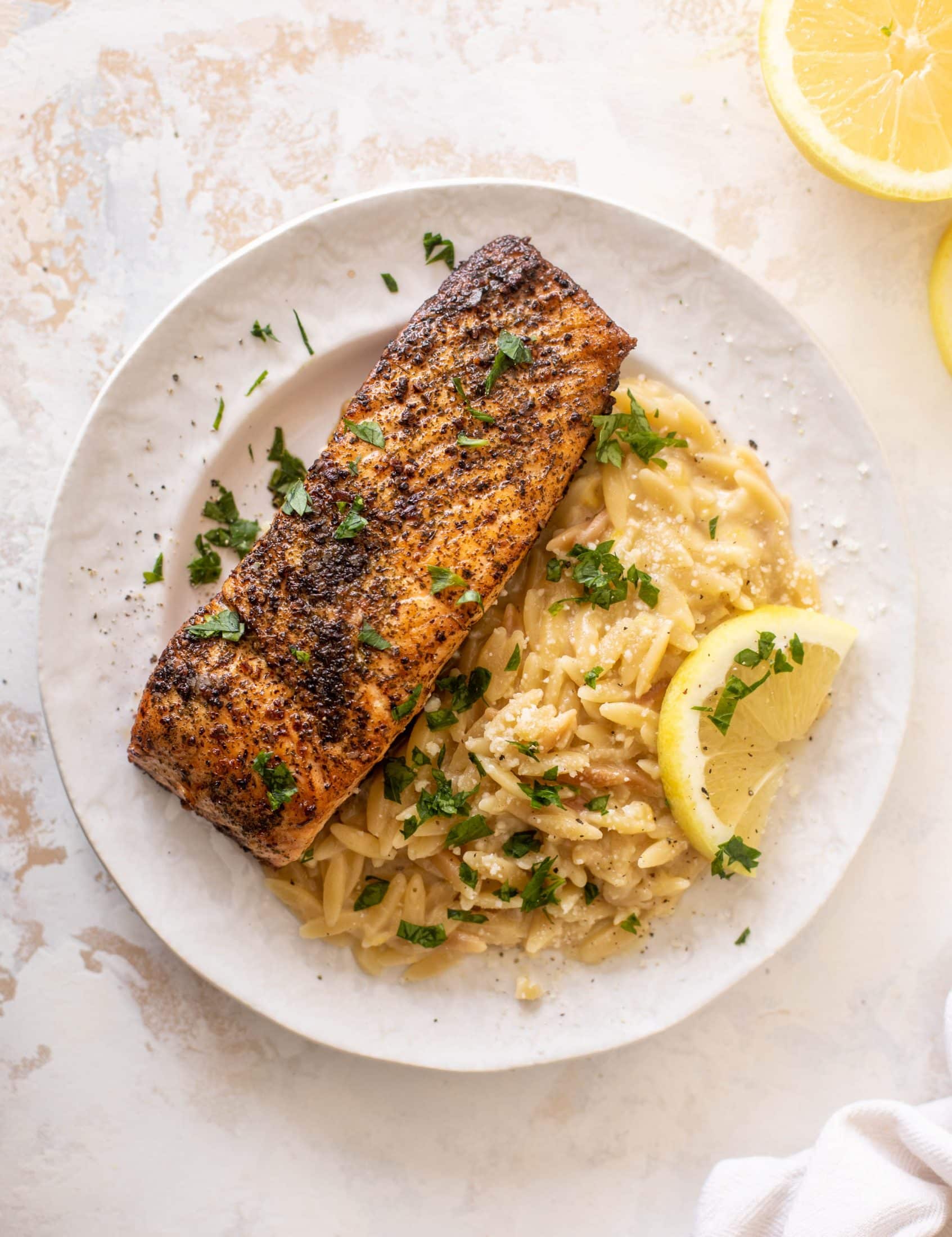 salmon aglio olio with lemon parm orzo