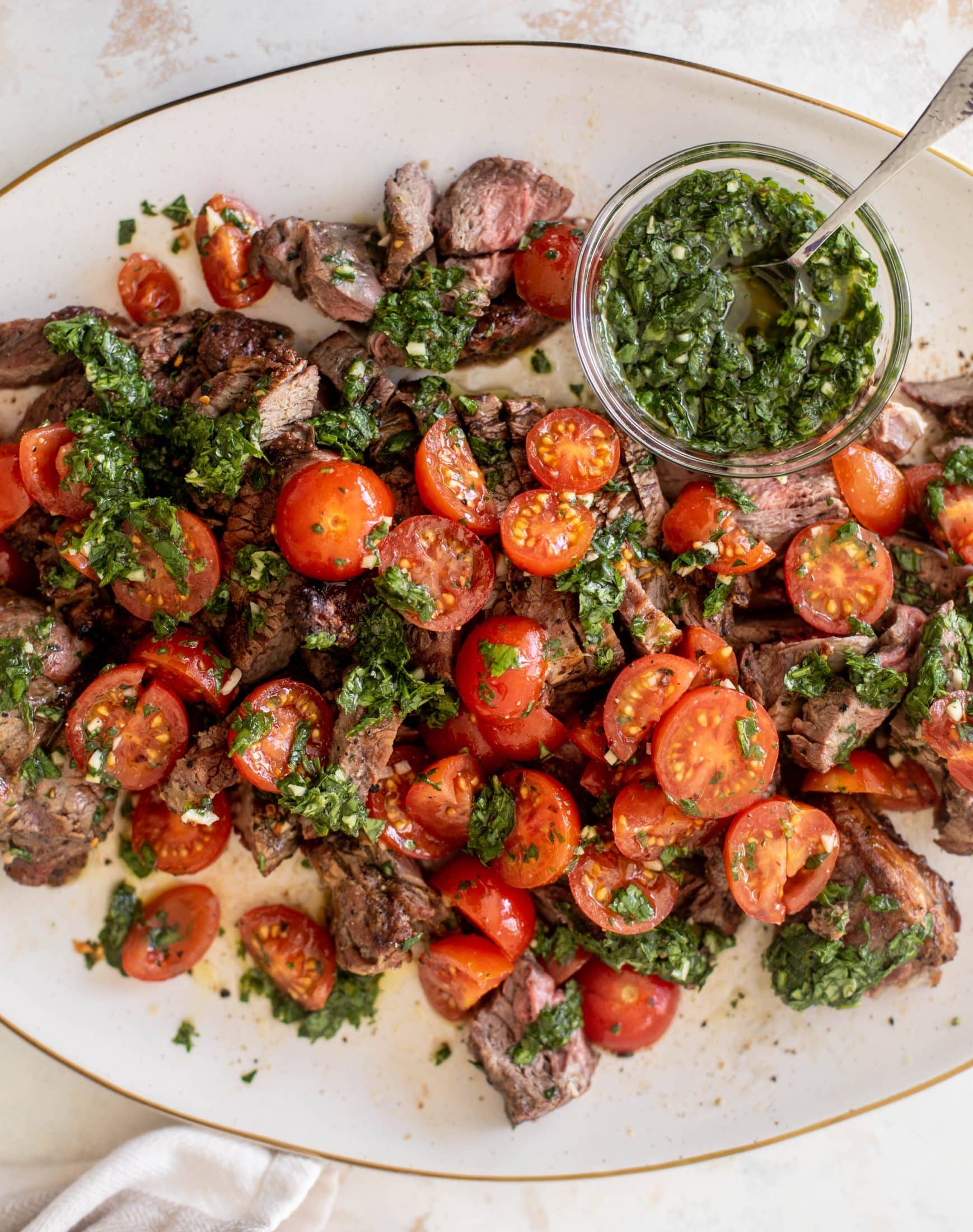 grilled steak with spicy marinated tomatoes